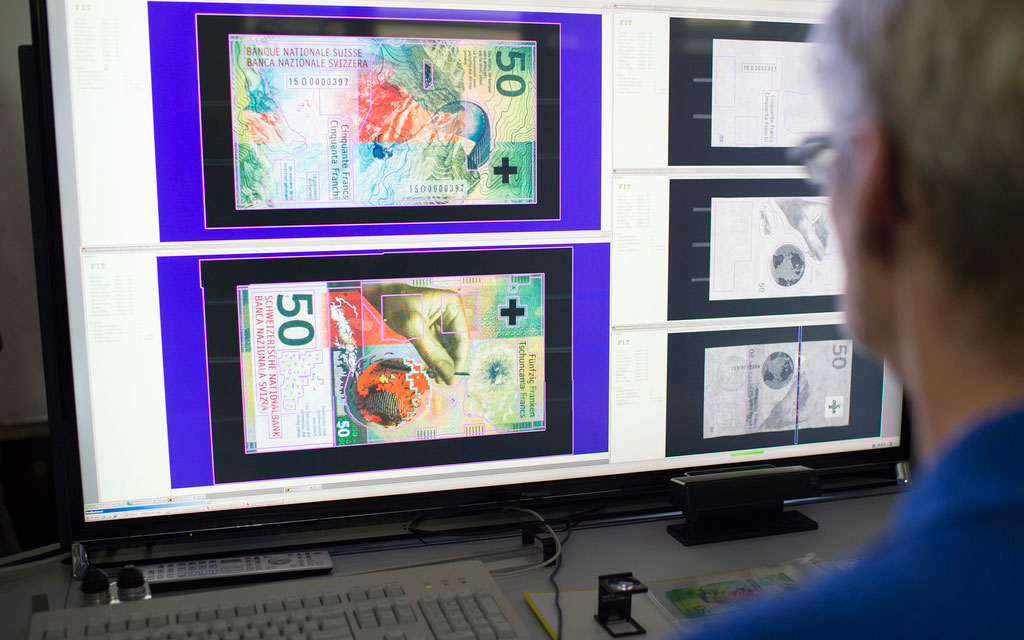 Details of the new 50-franc banknote on a computer screen